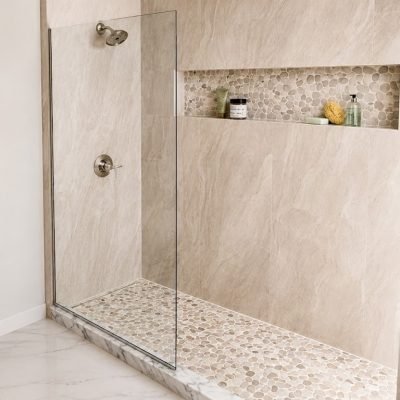 Fixed panel shower glass with channel